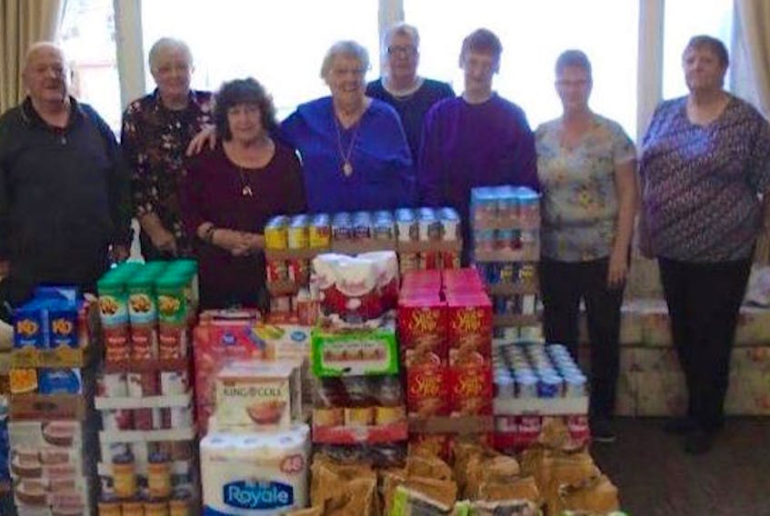 Residents of the Central Court seniors’ apartments in North Sydney held a Thanksgiving food drive in October to benefit their local food bank. Shown in front, left to right are Dan Cavanaugh, Violet Young, Mary Strickland and Sylvia Poirier. Back row is Helen McGee, Carlotta Skinner, Dorothy Ross and Marlene Cantwell. Donations to the North Sydney Community Food Bank came from residents and friends of the complex.