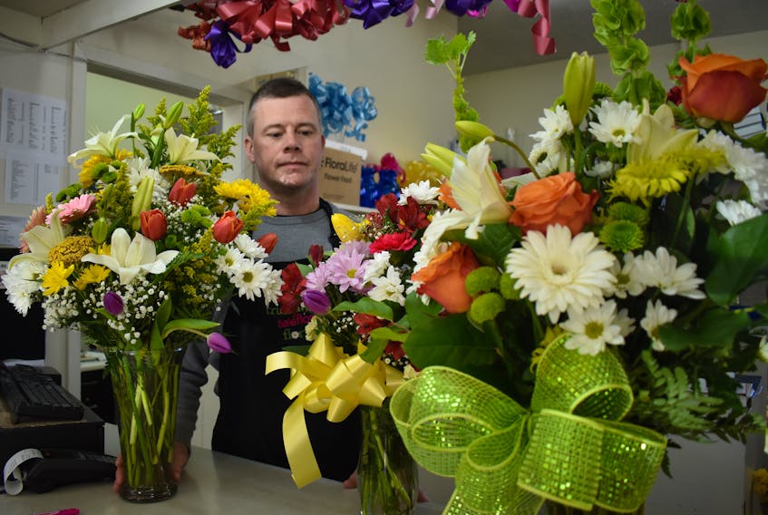 Tuesday may be the first day of spring, but it’s still a bit early for flowers to be growing outside. So, if you’re looking for some early spring flowers, your best bet is still a local florist, such as David Mackillop, shown here displaying a collection of tulips, lilies and daisies at Mackillop’s Flowers in Sydney.
