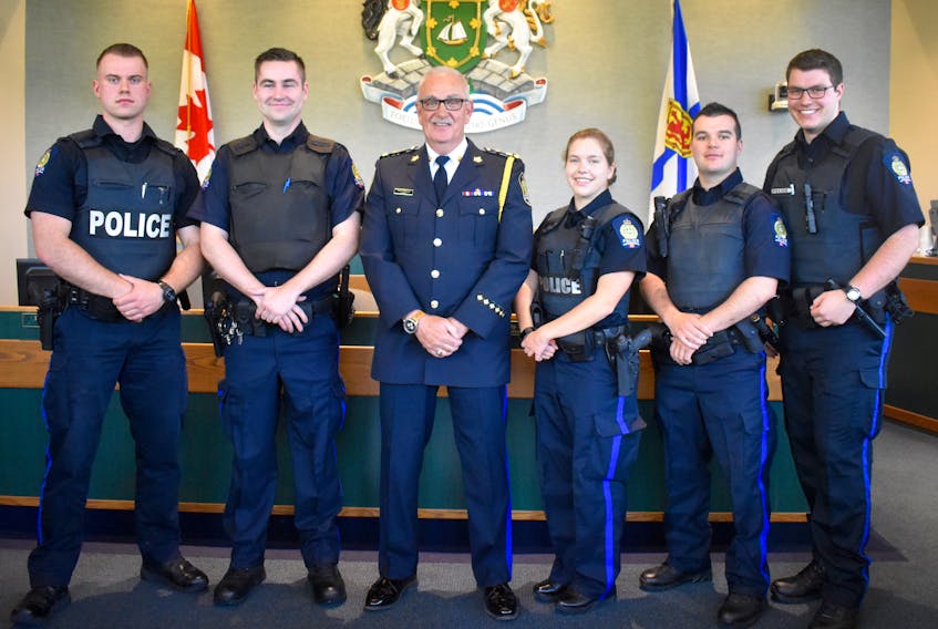 Five new Cape Breton Regional Police Service constables were sworn in on Wednesday at the city hall council chambers. From left: Const. Jesse MacGillivary, Const. Vincent MacKinnon, Chief Peter McIsaac, Const. Shea-Lynn McNeil, Const. Tyler Ross and Const. Logan Aucoin.