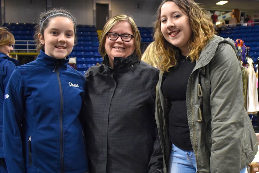 Robyn Lewis, 13, from left, her mom, Wendy, and her sister, Erika, attend the Home Crafters of Cape Breton Christmas Show every year as the kickoff to their holiday season.