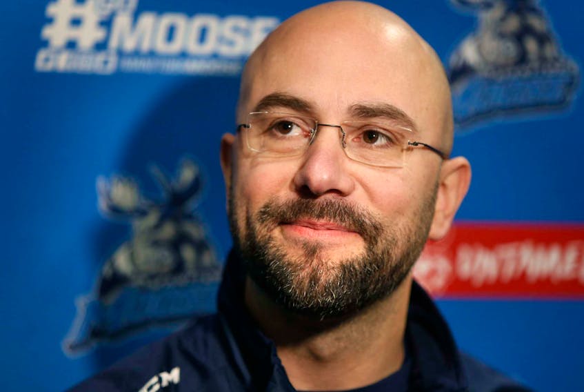 Pascal Vincent, head coach of the Manitoba Moose, is shown at the Bell MTS Iceplex in Winnipeg in this file photo. Vincent credits his nine seasons in Cape Breton with helping him reach goal of becoming a professional hockey as a coach.