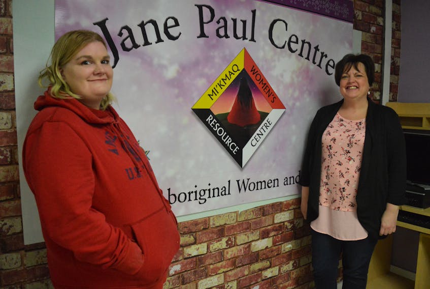 Krissy Poulette and social worker Beth Miller stand next to the sign for the Jane Paul Centre in Sydney. It’s the only drop-in centre in Cape Breton for First Nation women in vulnerable situations, providing services to help them better their lives.