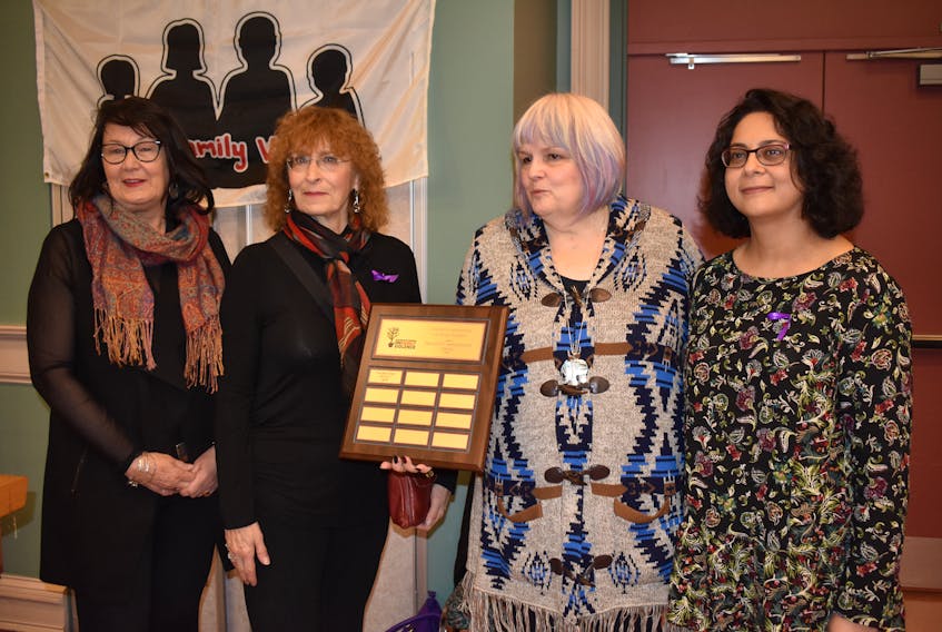 The Cape Breton Interagency on Family Violence presented its annual Heartfelt Appreciation Award to the Ann Terry Society, which assists women to enter the paid workforce by providing career development services that are women-centred. Taking part in the presentation were, from left, Ann Terry Project manager Ann McPhee, Ann Terry Society board member Patty Guy, interagency co-chair Helen Morrison, and society board member Saba Mohsin.
