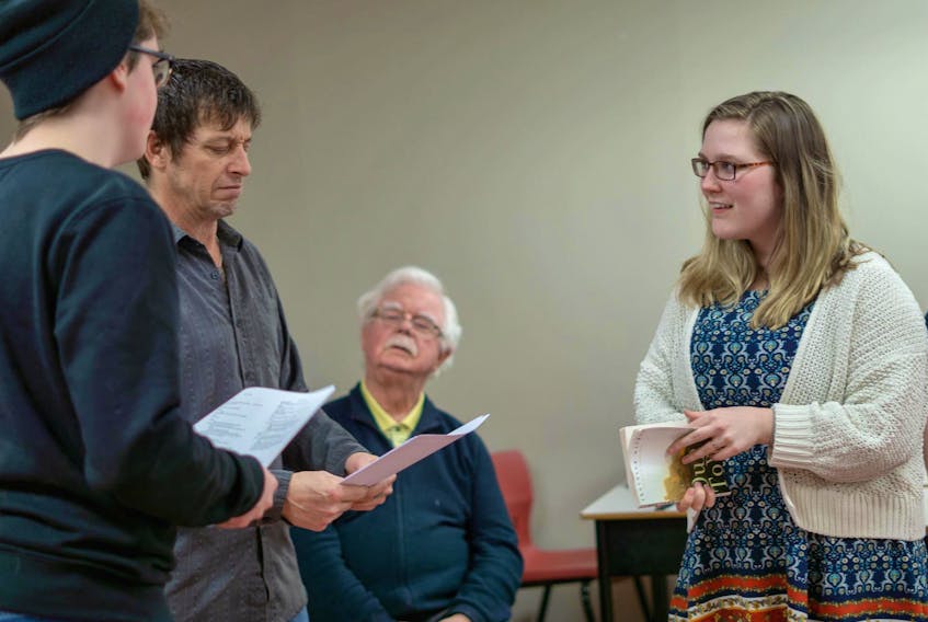 “Our Town” co-director Bridget Baldwin gives guidance to actors from left, Kevin Munro and Rob Bowden while cast mate Bob Lewandowski looks on. The Theatre Kompakt production opens at the Boardmore Playhouse Saturday, June 28. Contributed/Chris Southwell, Theatre Kompakt)