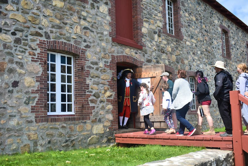 At the door, the Marquee de Maison Fort (played by re-enactor Joe Moroze) greets people entering the Bigot Theatre at the Fortress of Louisbourg on Sunday for the Taste of History event. It was the second year for the event which features four important dates in Canadian history, picks popular food from those times and gives a quick overview of what happened during that year before each course.