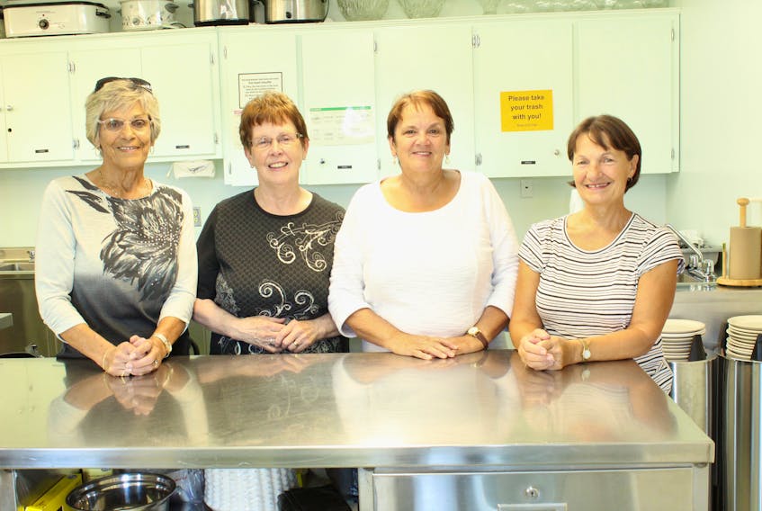 Members of the Bras d’Or Catholic Women’s League were busy last week with preparations for the annual St. Joseph’s Parish fall fair. The event is highlighted Wednesday by either an eat-in or take-out roast turkey dinner. Shown from left are Eunice Hyde, Miriam Gouthro, Jane McNeil and Pauline MacLeod.