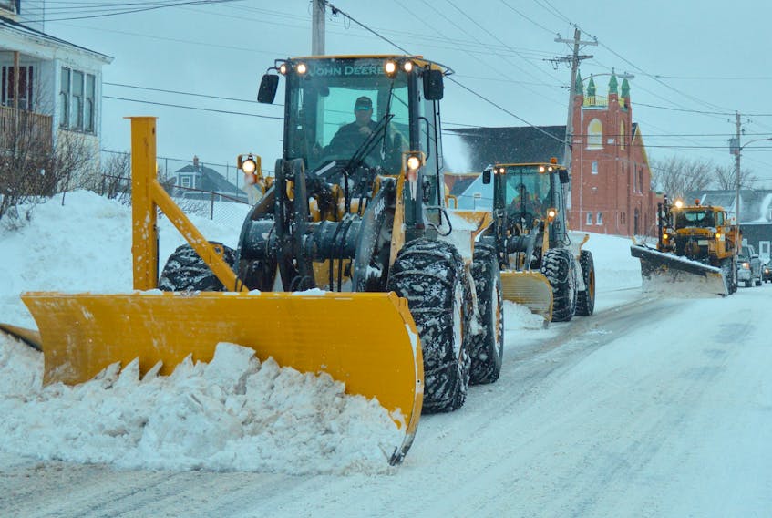 Whether we like it or not, winter is coming although meteorologists are predicting it could be milder than normal for Atlantic Canada. Milder weather can mean more precipitation. A snowplow is shown going through the streets of Whitney Pier on Feb 14 of this year.
