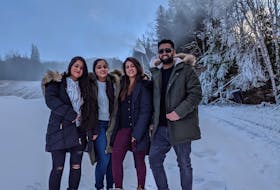 Friends, from left, Navjot Kaur, Balpreet Sandhu, Karima Singla and Gurinder Singh dropped by Ski Ben Eoin to check out its snowmaking activities. The students from India plan to ski at the hill this year.