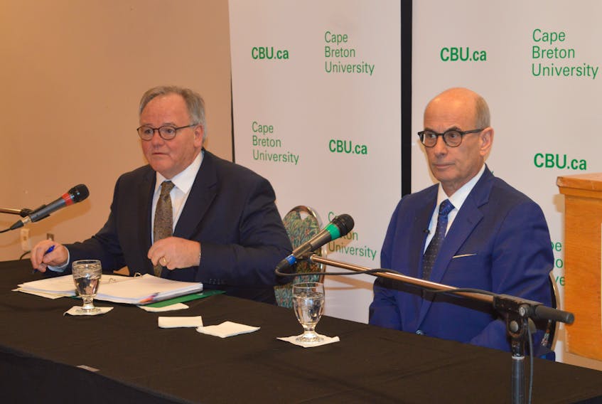 This file photo shows Cape Breton University board chair Robert Sampson and David Dingwall, right, as they appeared together on the day in late January when Dingwall was announced as the university’s next president. The terms of Dingwall’s employment contract have now been released.