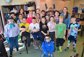 Grade 5 students at Étoile de l'Acadie in Sydney show off thecrazy, mismatched socks they wore for World Down Syndrome Day on Wednesday. Back row, from left, Ewan MacNeil, Christine Baker (teaching assistant), Abbie Moffatt, Rylan Price, Haven Postlethwaite. Middle row, from left, Lukas Reid, Zoé Poupart, Paxton Blackburn, Megan Gallant, Juliette Campbell, Ciaran McDonald, Evan Martell, Taylor Ranni (teacher). Front row, from left, Dominic McLeod, Baptiste Gillet, Charles LeVatte, HaydenThompson, Rowan MacLeod, Luke Burman, Jeremy Morneau. On the floor, Nathan Landry.