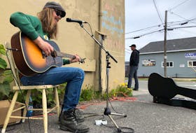 Jordan Musycsyn performs outside of Dr. Luke's Coffee House in Sydney on Thursday. The entertainer was part of the 2019 Celtic Colours International Festival.