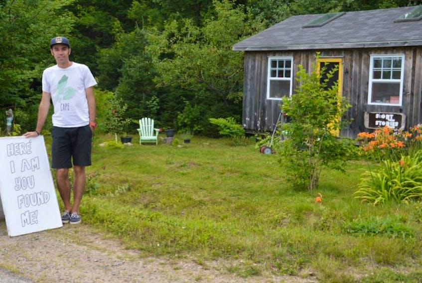 Photographer Leebly Brown stands outside his Short Stories gallery located on the Cabot Trail in River Bennet.
