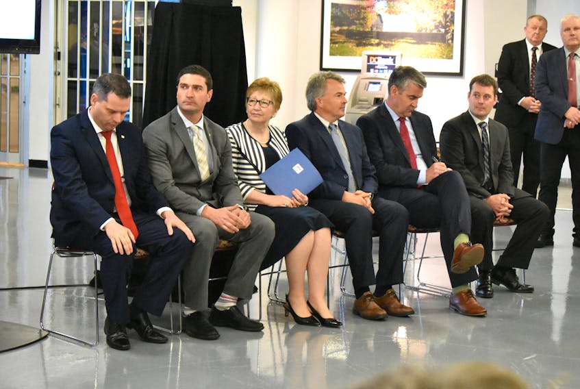 Sydney-Whitney Pier MLA Derek Mombourquette, from left, Glace Bay MLA Geoff MacLellan, NSHA CEO Janet Knox, Dr. Paul MacDonald, Premier Stephen McNeil and Health Minister Randy Delorey took part in the announcement of planned changes for the delivery of health care in Cape Breton in June. Delorey says he won’t attend a health care town hall meeting in North Sydney Sunday.