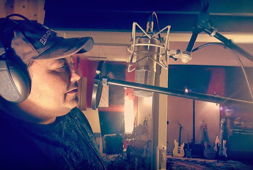 Sheldon O'Neil is shown in the recording studio, working on new music.