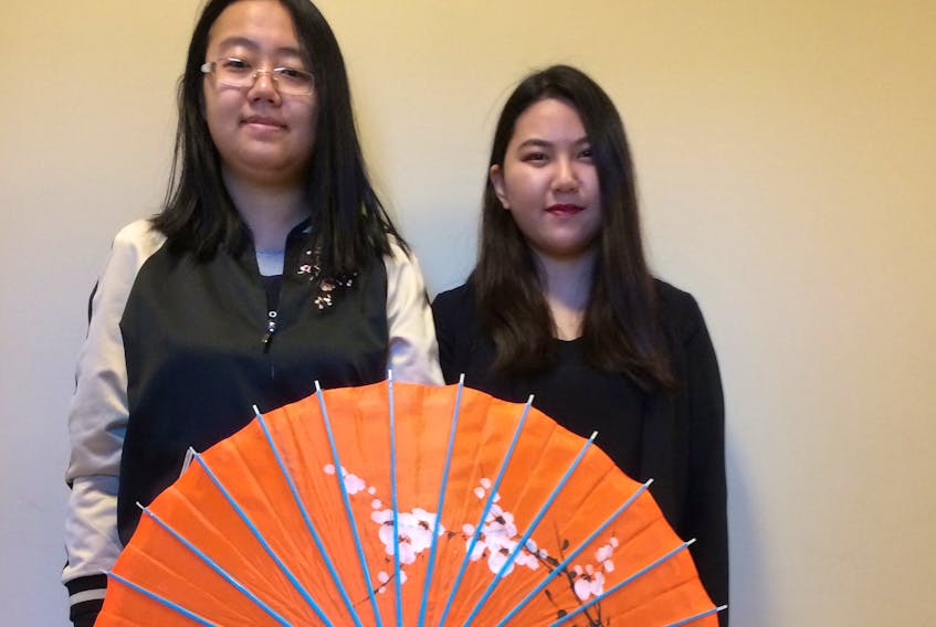 Leo (Liu Cui) and Ciel (Yutong Xiao), right, are Chinese students living in Cape Breton while completing a bachelor of hospitality and tourism management program at Cape Breton University. Submitted by Jennifer Currie
