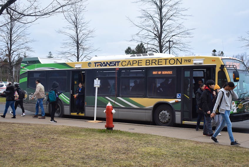Passengers disembark from a Transit Cape Breton bus at the temporary bus stop at Cape Breton University. The transportation system expects to experience 1.3-million rides in 2019, up from 650,000 rides in 2018 and 370,000 rides in 2017. However, the increased ridership means more cost to the Cape Breton Regional Municipality. City officials, while delighted with the recent and dramatic increase in ridership, are cognizant that the service’s success means more financial cost to the municipality.
