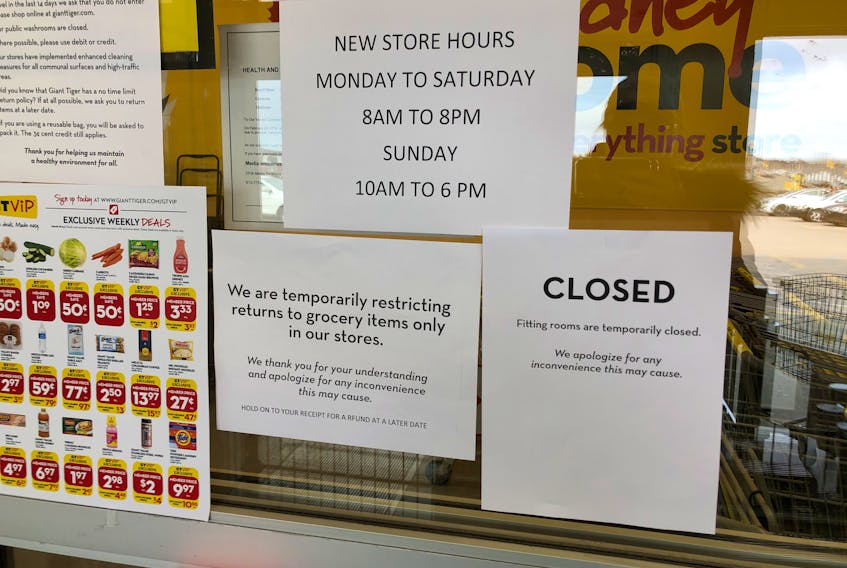 Signs on the front doors of Giant Tiger in Sydney advise costumers the fitting rooms and washrooms are closed, as well as there will be limited numbers of customers allowed inside due to COVID-19 precaution measures to stop the spread of the highly contagious virus. Some cashiers are grocery and retail outlets still open because they provide essential service have been worried about the number of people returning from trips out of province, who aren't following public health's recommendation to self-isolate for 14 days.