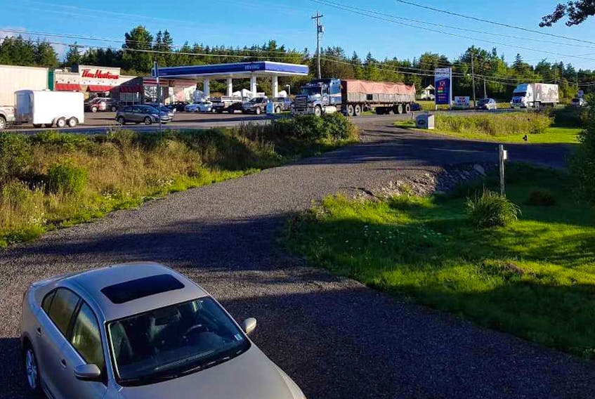 Heavy traffic is shown in front of the Irving/Tim Hortons location in Baddeck. The Department of Transportation plans to widen the highway and install a left-turning lane, eastbound, in an attempt to solve traffic issues in the area. Local residents believe the real issue is traffic flow within the Irving property.