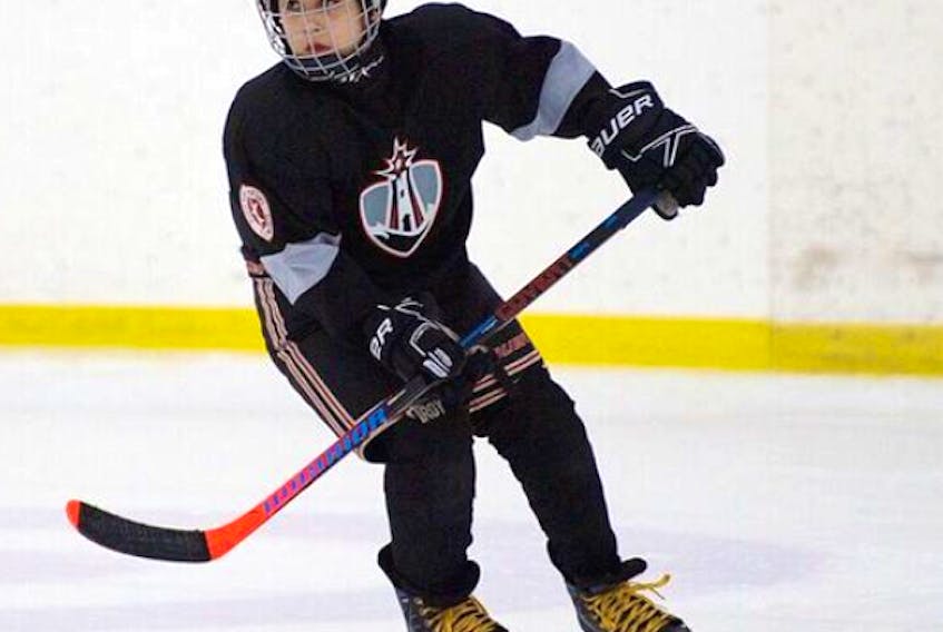 Cache Pierrard of We’koqma’q First Nation will suit up for the Canada Cowboys in the 2019 European Hockey Tour, which will take the 10-year-old to Italy, Austria and the Czech Republic, starting next week. CONTRIBUTED/NAOMI PIERRARD