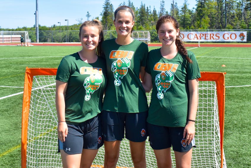 The Cape Breton Capers women's soccer team left for England Friday evening. The university team has been invited to train and play an exhibition game as guests of Leicester City FC. The team will be based in Leicester and will have access to state-of-the-art training facilities, trainers, coaches and a myriad of other top-of-the-line options while they train and play. The Capers will also play the role of ambassadors for the university. The team and coaches will travel to a number of locations in the country to host a series of school visits to promote CBU, the athletics program and all it has to offer. Shown are local soccer players who will participate in the trip as members of the Capers, from left, Maddie Coleman, Caleigh MacPherson and Tessa Dowie.