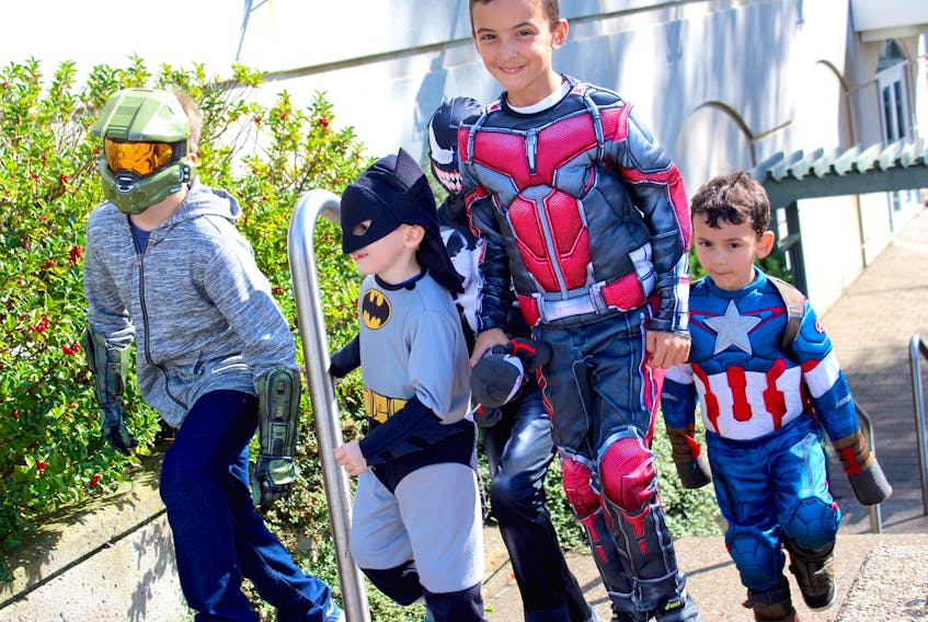 Dressed as their favourite fictional characters, this group of friends stormed into CaperCon on Saturday at Centre 200 in Sydney. From left are Aaron Fraser as Master Chief from Halo, Mason Deveau as Batman, Layne Roach as Venom, Gavin Roach as Ant-Man and Logan Roach as Captain America.