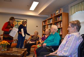 The Northside Community Guest Home’s 2017 Bells of Care campaign is now underway. Joan Gallagher and Glenda McKeough from the fundraising committee are shown discussing the campaign with residents, third from left, Thelma Piccot, Gavinna MacKenzie, Rose Piccot and Alice MacSween. GREG MCNEIL/CAPE BRETON POST