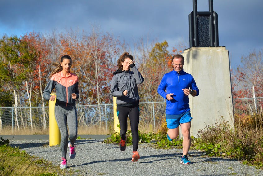Paula Gorospe, left, Chloe Donatelli and Shaun Lively headed out on foot during the Brooks Loop Fun Run on Saturday, beginning at the entrance to Rotary Park behind the Membertou Health and Wellness Centre. ERIN POTTIE/CAPE BRETON POST