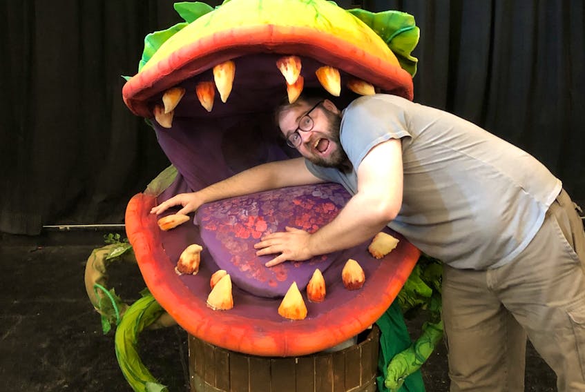 Highland Arts Theatre artistic director Wesley J. Colford tries to wrap his head around his theatre’s latest upcoming production, “Little Shop of Horrors,” which opens Oct. 29.