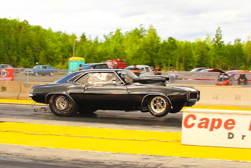 Tom Aucoin is shown driving his Super-Pro 1969 Camaro. Aucoin enjoyed some impressive trips down the strip at the Cape Breton Dragway on Sunday. After more than two days of rain, the track crew provided some great conditions and some excellent drag racing for Cape Breton fans. James Lyons of Port Morien claimed first place in the Super Pro class when he defeated Benny Niesten from Millville. The next event at Cape Breton Dragway takes place on July 26-28th. Full results from Sunday's event in today's scoreboard section. PHOTO SUBMITTED/GERARD BRYDEN