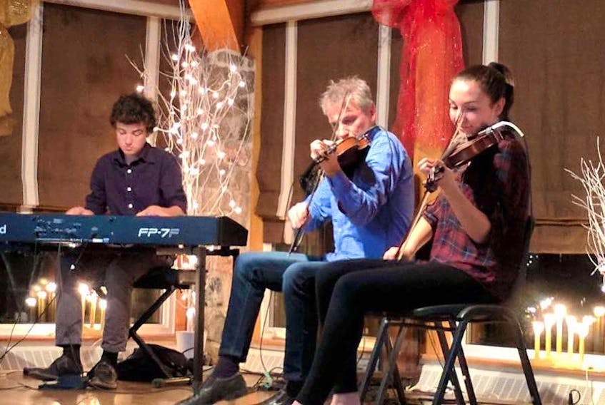 Among the featured performers that have taken part in Gaelic College’s Wednesday night ceilidhs are, from left, Mark, Brian and Abigail MacDonald, son, father and daughter, respectively, from St. Andrew's that performed last year.