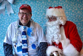 Ed Brown is shown with Santa Claus as part of Christmas activities at the Breton Ability Centre this year.