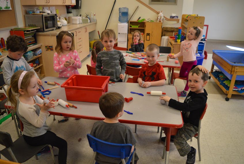 Students at Baddeck Nursery School, located inside Baddeck Academy, enjoy time making things out of playdough on Monday. At the first table, in no particular order, Gage Deveaux, Brayden Garland, Jacob Kenny, Hazel MacDonald, Aiden MacRae, Emmett MacSween and Abbigail Phillips. At the second table, in no particular order, Riley Campbell, Molly MacAskill and Sophie Morrison.