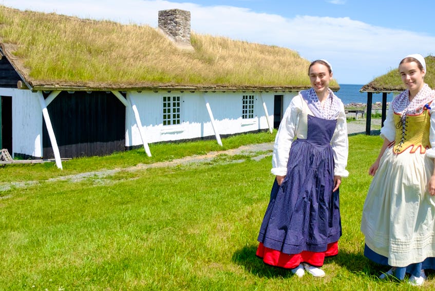Basque students Mirari Loyarte Aramburu, left, and Amets Aranguren Arrieta are shown in front of the Desroches building at the Fortress of Louisbourg site. Both are in Cape Breton to interpret the history and culture of the Basque people who came to the Fortress in the 18th century. CONTRIBUTED/PARKS CANADA