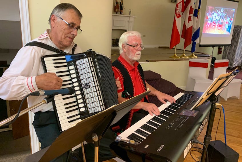 Joe Ryba, left, and Robert Lewandowski provided entertainment at a recent celebration at the Polish Village Hall in Whitney Pier to mark the 110th anniversary of the St. Michael’s Polish Benefit Society. The society is the first and oldest Polish organization in eastern Canada. It does various service and cultural projects, and operates the Polish Village Hall as a cultural hub. The 110th anniversary celebration also included a series of workshops and gatherings and a pop-up museum will be held later this year. CONTRIBUTED/SAJIVE KOCHHAR