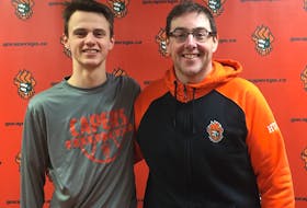Jason Callaghan of Sydney, a guard with the Sydney Academy Wildcats, left, has committed to play for the Cape Breton Capers men’s basketball team starting in 2018-19. Callaghan is shown with Capers head coach David Petroziello.