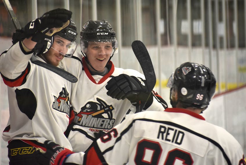 From left, Mitchell Johnston, Brody McCarron and Daniel Reid celebrate Johnston’s goal in the first period of play at the 2018 Don Johnson Memorial Cup Atlantic junior ‘B’ hockey championship Thursday at the Membertou Sport and Wellness Centre. Johnston’s goal stood up as the winner as the host Kameron Junior Miners defeated Newfoundland and Labrador’s Mount Pearl Junior Blades, 3-0.
