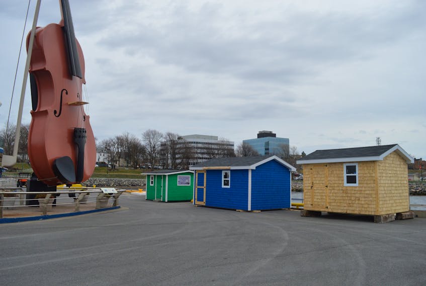 Four small buildings have been added to the area of the big fiddle at the Joan Harriss Cruise Pavilion as the Port of Sydney Development Corp. looks to expand the retail offerings available for visitors to the port. In all, 17 businesses will operate there this season, up from 10 last year.