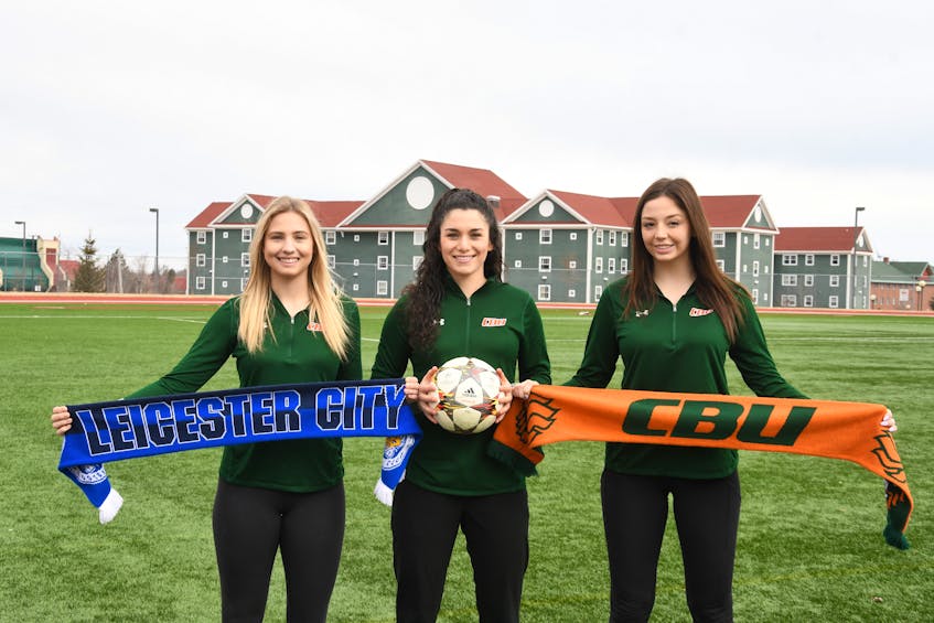 The Cape Breton Capers women’s soccer team will travel to England to train and play an exhibition game against Leicester City FC in August. Pictured are the Capers’ captains, from left, Rachel Yerxa, Ciera Disipio and Amelia Carlini. PHOTO SUBMITTED/CAPE BRETON UNIVERSITY