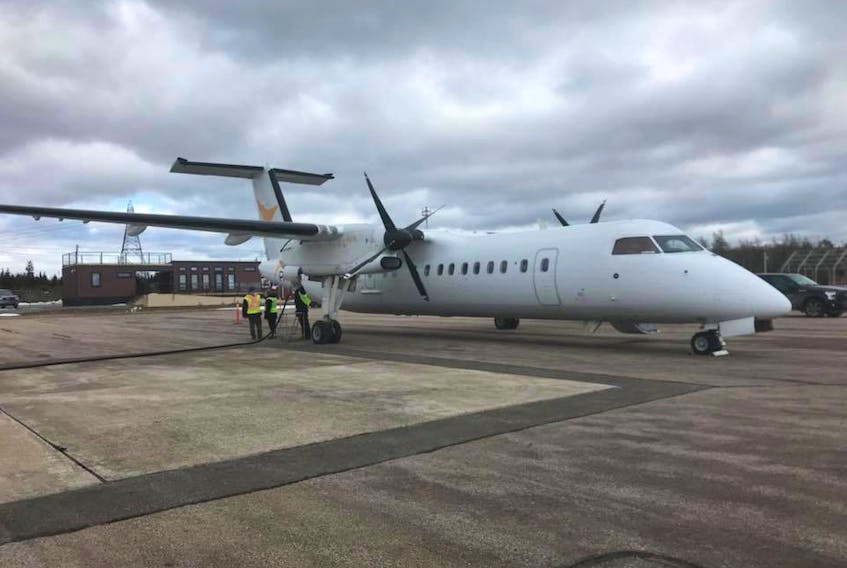 A Dash 8 operated by regional carrier PAL Airlines based out of St. John’s, N.L., refuels at the Allan J. MacEachen Port Hawkesbury Airport located in Port Hastings in this file photo. A tender has been issued for extensive crack sealing at the airport’s runway.