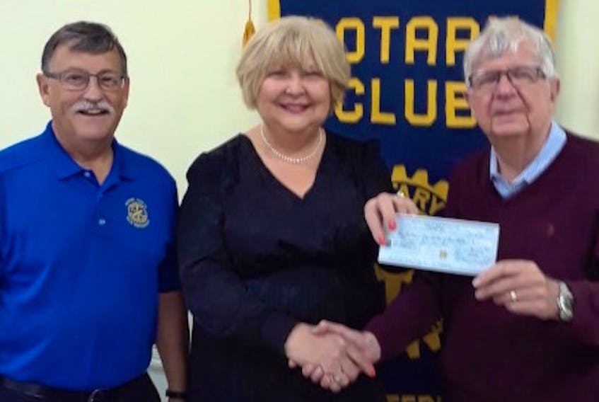 Rotarians Hubert Chiasson and Duncan Roach presented a cheque to Francine Hall, the executive director of Big Brothers Big Sisters of Cape Breton. Hall attended a recent meeting of the New Waterford Rotary Club to update the Rotarians on the work that Big Brothers Big Sisters is doing in local communities.