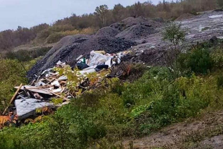A large amount of household wasted and discarded contracting materials was found illegally disposed of near the water tower in Reserve Mines, a problem area for improper dumping in the Cape Breton Regional Municipality for years (some believe decades.) Multiple people were charged until municipal bylaw 12 section 4 regarding illegal dumping and disposing of materials over the last year and municipal crews did a significant clean-up of the area last year. Officers confirm a charge in relation to this improper disposal of materials has already been laid and the party charged is currently in court in relation to another charge regarding a similar issue. CONTRIBUTED/CAPE BRETON ENVIRONMENTAL ASSOCIATION