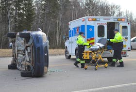 This file photo shows an Emergency Health Services ambulance responding to a two-vehicle accident in Gardiner Mines.