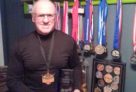 Ron Delaney of Sydney is shown with his many powerlifting accolades, including his first-place finish at the 2018 Canadian Powerlifting Union Championships held in Calgary, Feb. 20-24. Delaney was also recognized with the Bill Jamison Award for his contributions to the sport.