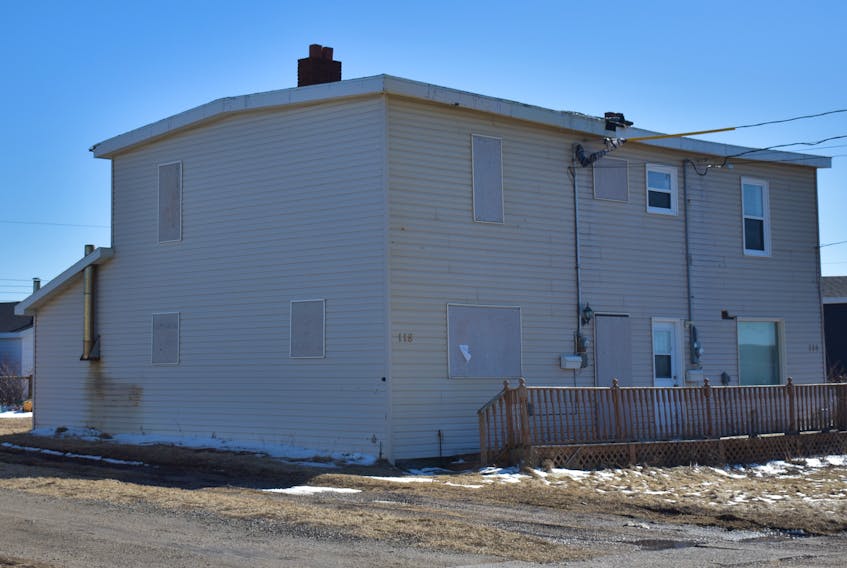 The left half of this Glace Bay company house will be demolished after Cape Breton Regional Municipality council gave its approval for demolition. One side of the structure was deemed dangerous and unsightly and its state of disrepair is costing the owner of the other half, Kimmy Losier, a significant amount of money.