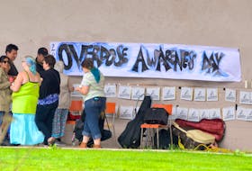 People gather in the bandshell before the start of Overdose Awareness Day in Sydney in August 2017.