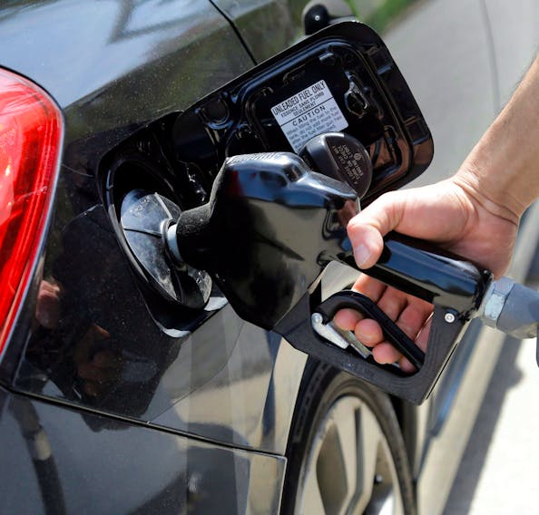 Gas is pumped into a motor vehicle in this file photo. When columnist Adrian White spoke to friends in Western Canada over the past few days, he learned that they were upset with voters in Cape Breton. They feel betrayed having provided employment for many Atlantic Canadian families only to have the region vote for a government not friendly to the Western resource sector.