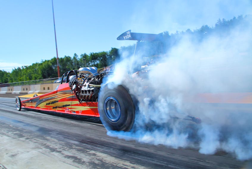 Doug Forbes of Douglas, N.B., won “Low ET” for the Ideal Electric Quick 16 held at Cape Breton Dragway on Sunday. Forbes was a crowd favorite, with about 2,000 horsepower on tap, he covered the 1/8 mile in 4.377 seconds at 163.23 miles per hour.