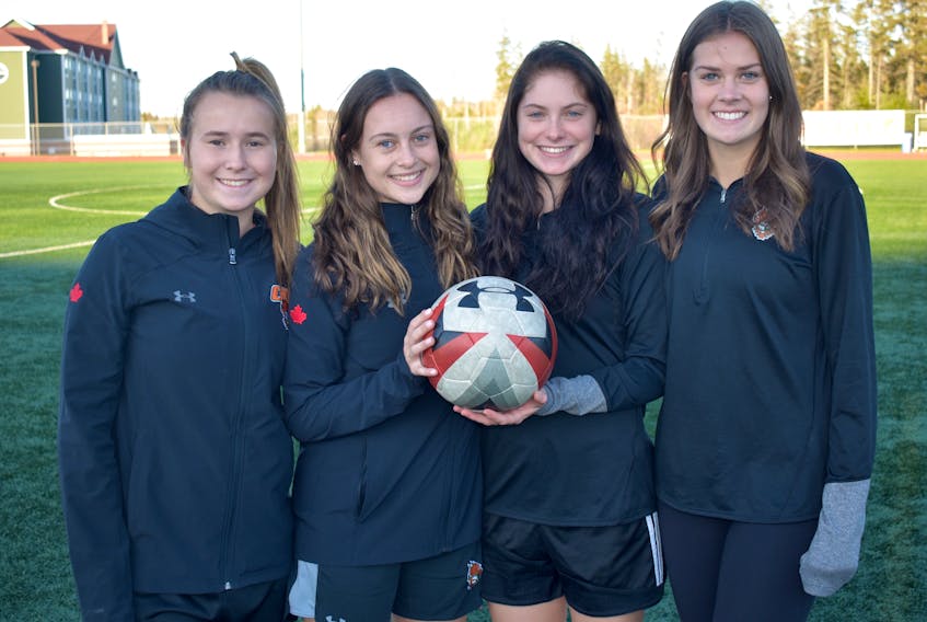 Four local soccer players are playing for the Cape Breton Capers women’s soccer team this season. The women will play in the Atlantic University Sport championship tournament this weekend in Sydney. From left, Maddie Coleman (Sydney), Amy Lynch (Sydney), Tessa Dowie (New Waterford) and Caleigh MacPherson