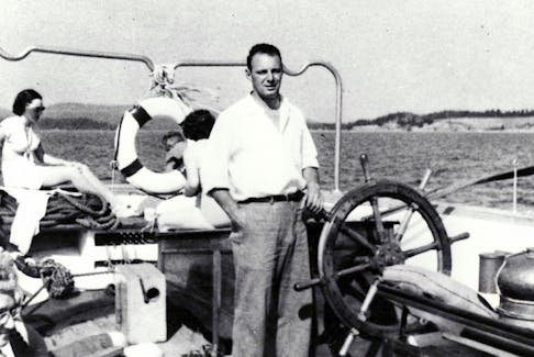 Capt. Walter Boudreau at the helm of The Yankee.