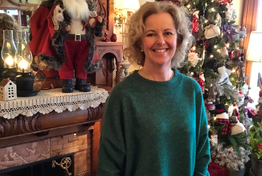 Mary Walker, one of the owners of Granny’s Country Cottage in North Sydney, took a break from their Black Friday sale to pose for a photo. More and more smaller merchants are offering discounts during the unofficial start to the holiday shopping season.